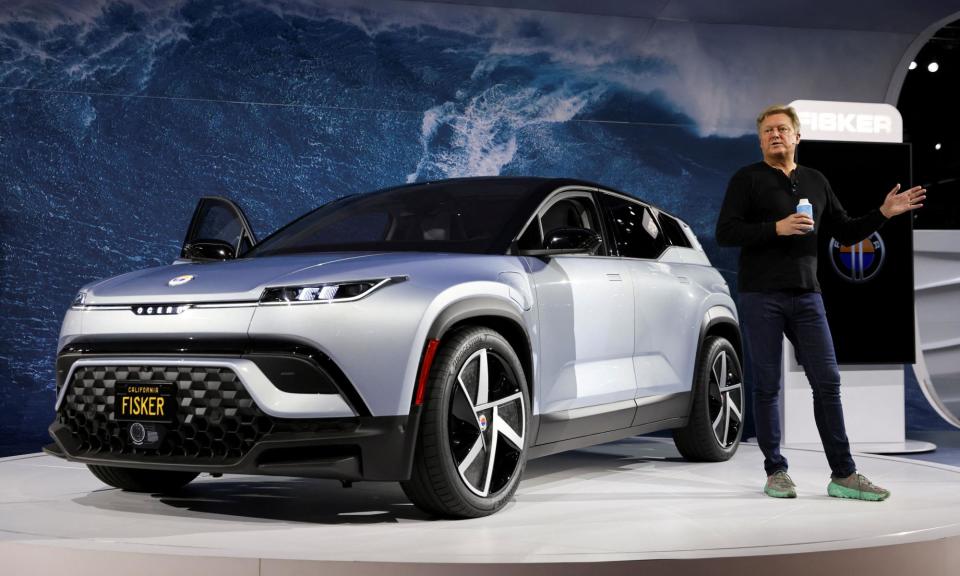 <span>Henrik Fisker, seen here unveiling the Ocean SUV at the Los Angeles auto show in November 2021, founded the company with his wife, Geeta Gupta-Fisker, in 2016. Production of the Ocean was halted in March.</span><span>Photograph: Mike Blake/Reuters</span>