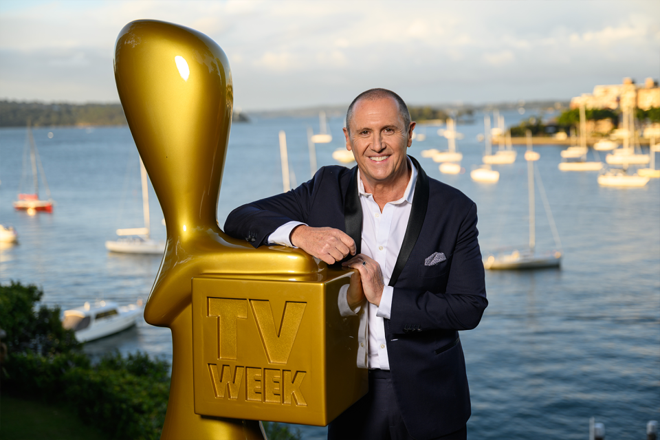 Larry Emdur posting with a Gold Logie.