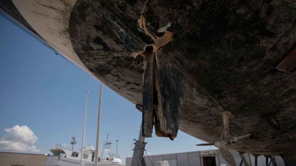 The rudder of a ship damaged by orcas while in the Strait of Gibraltar is shown in Barbate in southern Spain, on May 31. Officials advise crews to shut off the engine or lower sails during orca encounters, marine biologist Hanne Strager said. - Jorge Guerrero/AFP via Getty Images