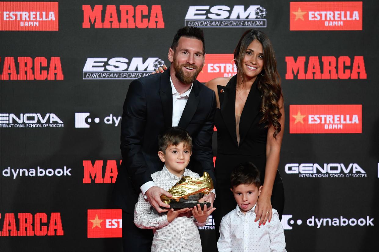 BARCELONA, SPAIN - OCTOBER 16: Lionel Messi (rear L) of FC Barcelona poses with his wife Antonella Roccuzzo (rear R) and their two sons after receiving the 2018-19 Season European Golden Shoe award for Europe's top scorer for the sixth time during the Golden Shoe Award Ceremony at Antiga Fabrica Estrella Damm on October 16, 2019 in Barcelona, Spain. (Photo by Adria Puig/Anadolu Agency via Getty Images)