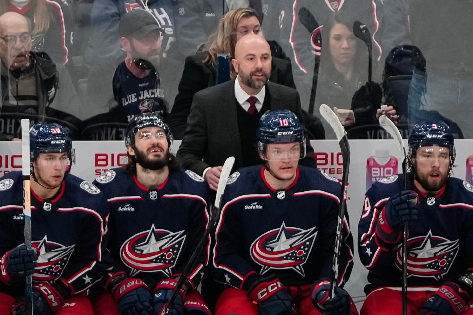 Dec 8, 2023; Columbus, Ohio, USA; Columbus Blue Jackets head coach Pascal Vincent watches from the bench behind Russians, from left, right wing Yegor Chinakhov (59), right wing Kirill Marchenko (86), left wing Dmitri Voronkov (10) and defenseman Ivan Provorov (9) during the second period of the NHL game against the St. Louis Blues at Nationwide Arena.