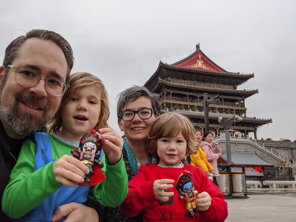 Family posing for photo in China