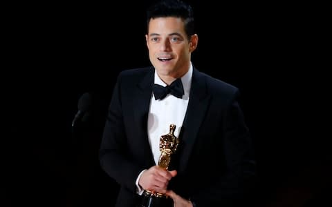 Rami Malek accepting the Best Actor award for his role in Bohemian Rhapsody - Credit: MIKE BLAKE/REUTERS