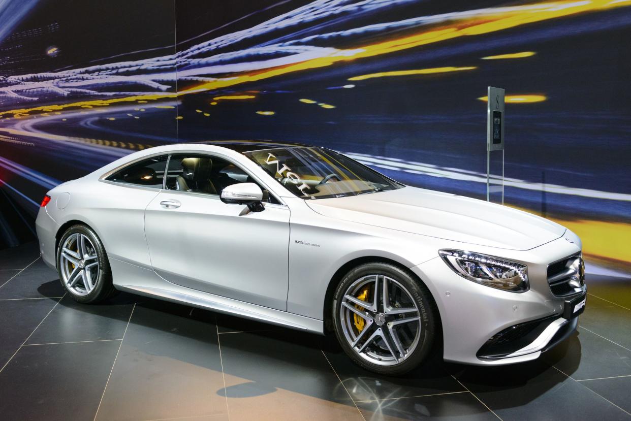 Brussels, Belgium - January 15, 2015: Mercedes-Benz S-Class S65 AMG coupe on display during the 2015 Brussels motor show. People in the background are looking at the cars.