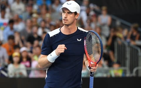 Britain's Andy Murray reacts after a point against Spain's Roberto Bautista Agut during their first round men's singles match on day one of the Australian Open tennis tournament in Melbourne on January 14, 2019 - Credit: AFP