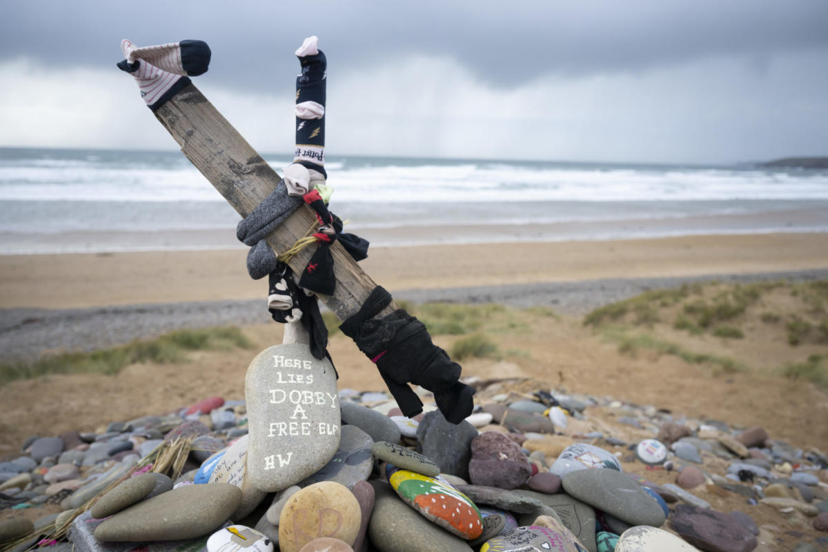 Harry Potter fans told to stop leaving socks at Dobby's grave on a Welsh  beach : NPR