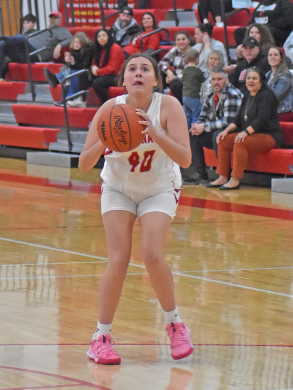 Coldwater senior Kaitlyn Garcia (40) lines up a jumper Tuesday versus Sturgis. Garcia would sink the shot for her first career varsity points.