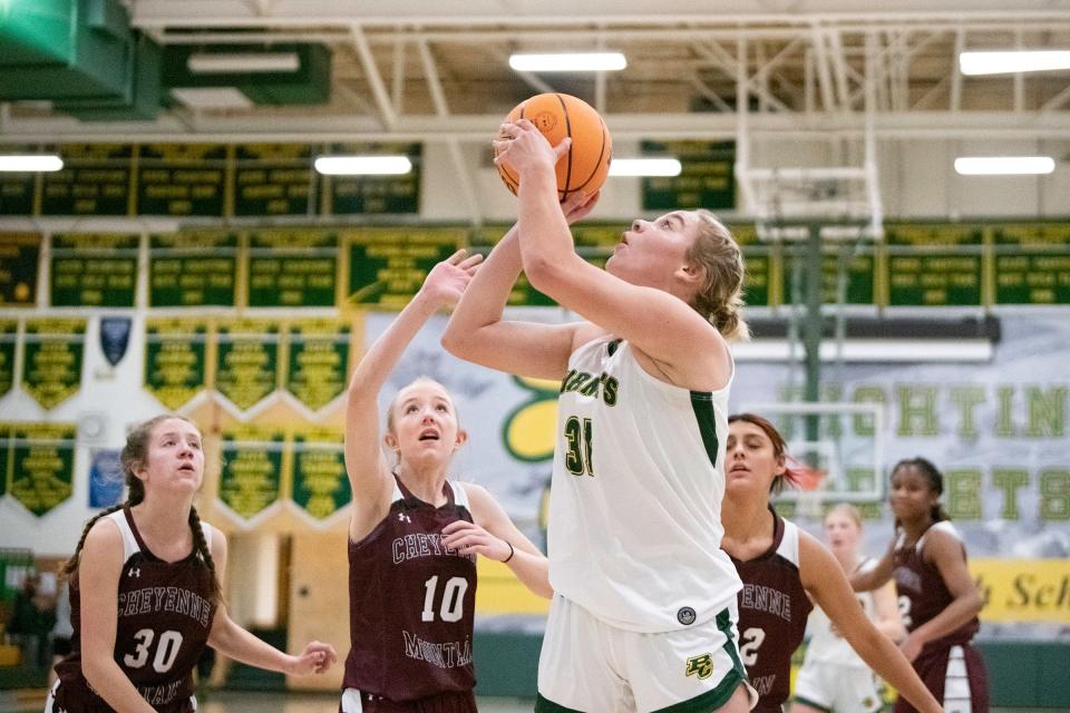 Pueblo County's Rylee Stupnik goes in for a layup in a game against Cheyenne Mountain on Friday, Dec. 9, 2022