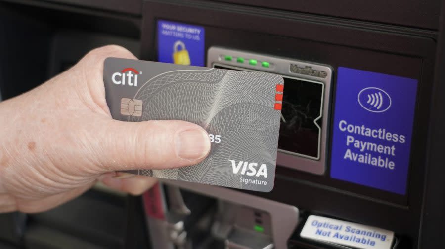 A customer uses the contactless payment chip in their Visa card to purchase gasoline in 2021 at a station in Ridgeland, Miss. (AP Photo/Rogelio V. Solis, File)