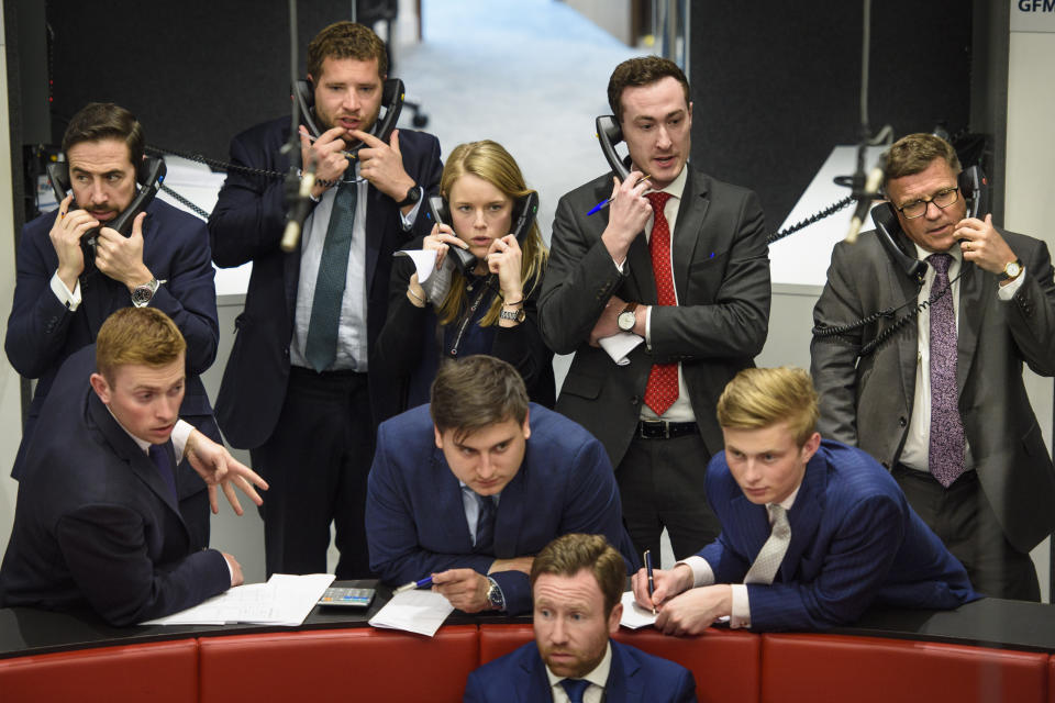 Traders in 'The Ring' at the London Metal Exchange in London. Photo: Matt Crossick/EMPICS PA