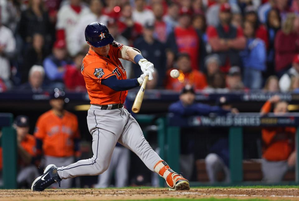 Astros third baseman Alex Bregman hits a two-run double in the fifth inning.