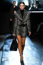 <p>The My Body author took to the runway at Michael Kors' autumn/winter 22 show during New York Fashion Week dressed in a statement leopard-print mini skirt ensemble, complemented by coordinating heels for grown-up edge. </p>