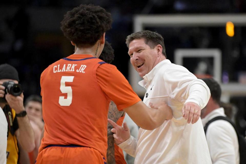 Mar 28, 2024; Los Angeles, CA, USA; Clemson Tigers head coach Brad Brownell celebrates with forward Jack Clark (5) after defeating the Arizona Wildcats in the semifinals of the West Regional of the 2024 NCAA Tournament at Crypto.com Arena. Jayne Kamin-Oncea/USA TODAY Sports