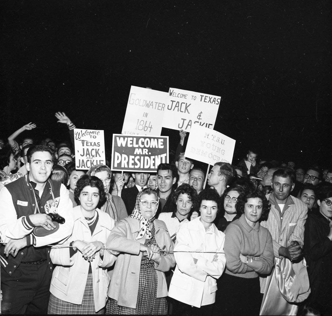 Crowd waits at Carswell AFB in Fort Worth for arrival of President John F. Kennedy and wife Jackie, Nov. 21, 1963