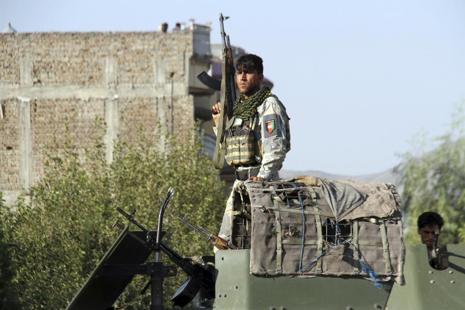 Afghan security forces arrive near the site of a suicide bombing and gun battle as militants attempted to storm a government office, in Jalalabad, the provincial capital of eastern Afghanistan, Wednesday, Sept. 18, 2019. The violence comes as Afghanistan prepares for presidential elections on Sept. 28, a vote the Taliban vehemently oppose. (AP Photo)wld