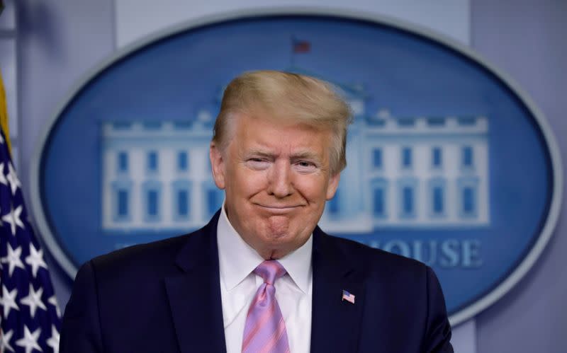 President Donald Trump reacts during the coronavirus response daily briefing in Washington