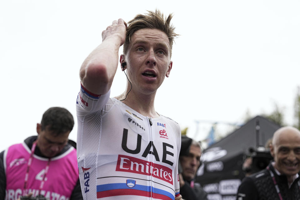 Tadej Pogačar reacts after crossing the finish line to win stage 2 of the Giro d'Italia from San Francesco al Campo to Santuario di Oropa, Italy, Sunday, May 5, 2024. (Marco Alpozzi/LaPresse via AP)