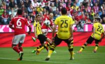 Football Soccer - Bayern Munich v Borussia Dortmund - Bundesliga - Allianz Arena, Munich, Germany - 8/4/17 Bayern Munich's Arjen Robben shoots at goal Reuters / Michael Dalder Livepic