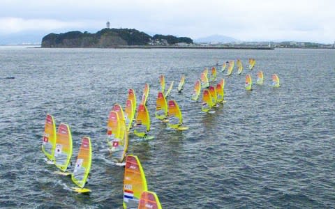 Competitors in the men's RS:X class windsurfing event as part of the sailing World Cup series - Credit: AFP