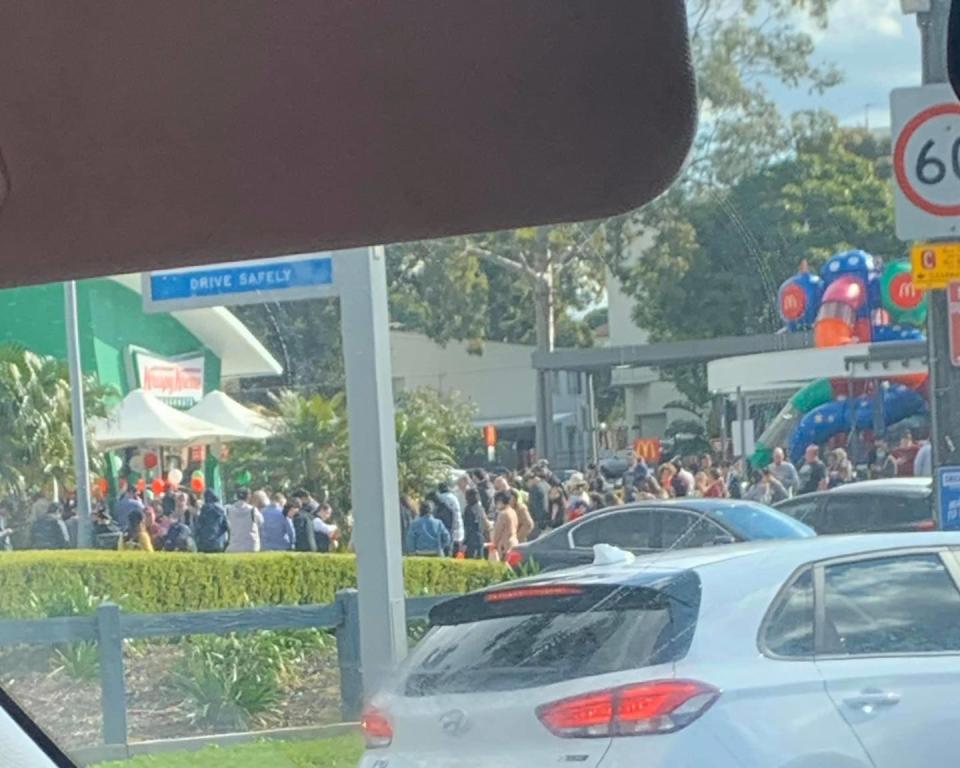 Photos of people swarming outside Krispy Kreme stores in Sydney did the rounds on social media, causing outrage. Source: Facebook/Police in the Area