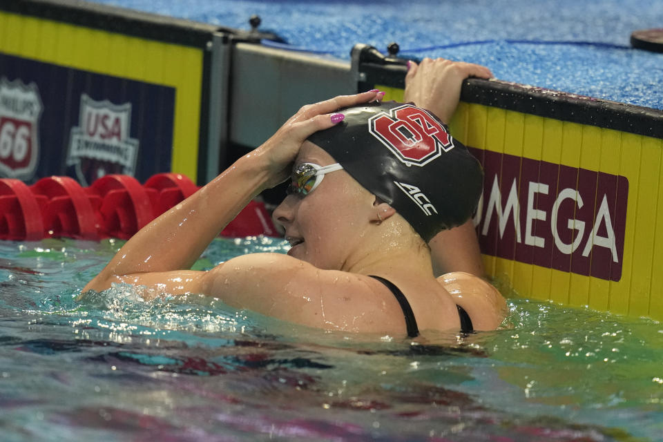 Katharine Berfkoff reacts after winning the women's 50-meter backstroke at the U.S. nationals swimming meet in Indianapolis, Thursday, June 29, 2023. (AP Photo/Michael Conroy)