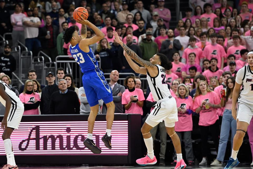 Creighton guard Trey Alexander shoots over Providence guard Devin Carter during the first half.