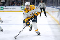 Nashville Predators' Filip Forsberg skates with the puck during the first period of the team's NHL hockey game against the New York Islanders in Elmont, N.Y., Saturday, April 6, 2024. (AP Photo/Peter K. Afriyie)