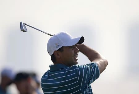 International team member, Jason Day practices his tee shot before the 2015 Presidents Cup golf tournament at the Jack Nicklaus Golf Club in Incheon, South Korea, October 6, 2015. REUTERS/Kim Hong-ji