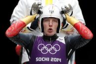 Germany's Tatjana Hueffner prepares for the start during the women's luge training at the Sanki sliding center in Rosa Khutor, a venue for the Sochi 2014 Winter Olympics near Sochi, February 6, 2014. REUTERS/Murad Sezer (RUSSIA - Tags: SPORT LUGE OLYMPICS)