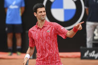 Serbia's Novak Đjoković reacts during his match with Argentina's Diego Sebastián Schwartzman during their final match at the Italian Open tennis tournament, in Rome, Monday, Sept. 21, 2020. (Alfredo Falcone/LaPresse via AP)