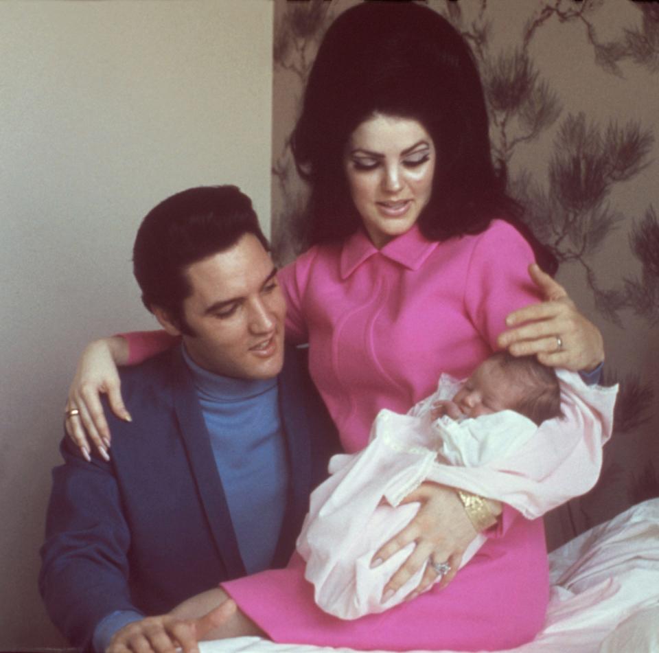 Rock and roll singer Elvis Presley with his wife Priscilla Beaulieu Presley and their 4 day old daughter Lisa Marie Presley on February 5, 1968 in Memphis, Tennessee.