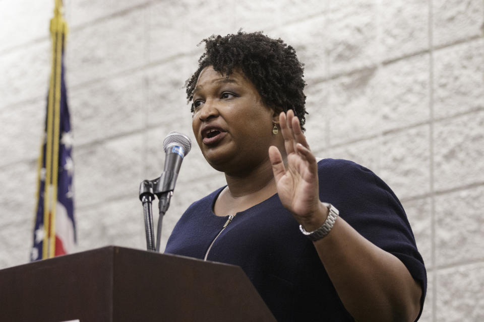 Democratic candidate for governor Stacey Abrams speaks during a town hall forum at the Dalton Convention Center on Wednesday, Aug. 1, 2018, in Dalton, Ga. Abrams is running against Republican candidate Brian Kemp in Georgia's November general election. (Doug Strickland/Chattanooga Times Free Press via AP)