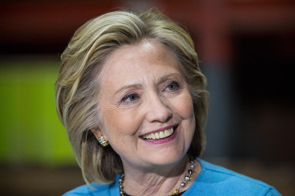 Democratic presidential candidate and former U.S. Sectetary of State Hillary Clinton speaks to employees of Whitney Brothers, an educational furniture manufacturer, at a round table discussion on April 20, 2015 in Keene, New Hampshire. This marked Clinton's first major political event in New Hampshire after announcing her campaign for president a little over a week before.  (Photo by Andrew Burton/Getty Images)