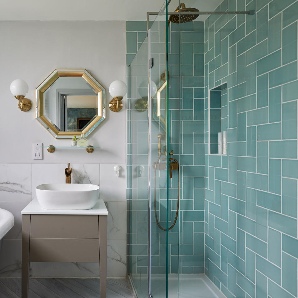 bathroom with tiles and shower