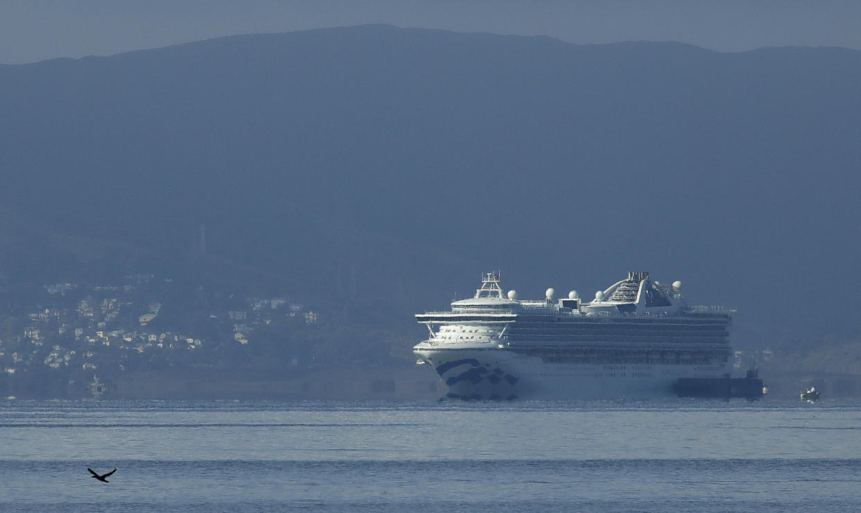 The Grand Princess plies the waters of San Francisco Bay. The ship docked in Oakland on March 9 with passengers and crew members who tested positive for coronavirus. (Photo: Ben Margot/ASSOCIATED PRESS)