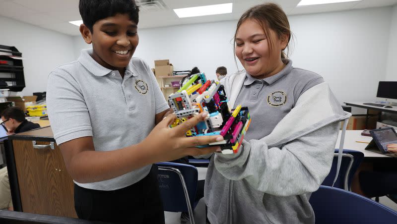 Divan Narsipuram and Lilly Ostler work with an autonomous robot at the Beehive Science and Technology Academy in Sandy on Nov. 3, 2022. This week is National School Choice Week. 