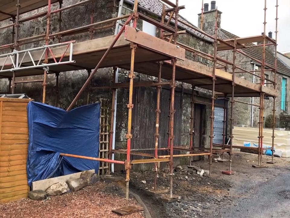 Scaffolding around the building.