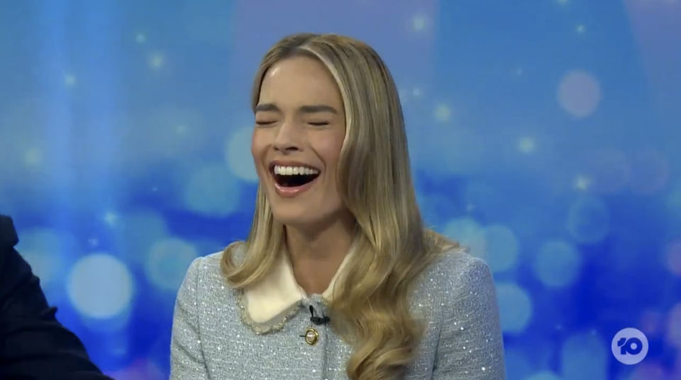 Margot Robbie laughing on The Project