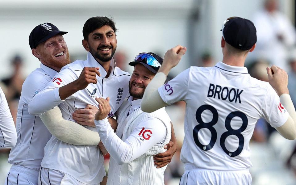 Shoaib Bashir of England celebrates with team mates after bowling out Jason Holder during day four of the 2nd Test Match between England and the West Indies at Trent Bridge