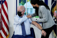 President Joe Biden receives a COVID-19 booster shot during an event in the South Court Auditorium on the White House campus, Monday, Sept. 27, 2021, in Washington. (AP Photo/Evan Vucci)