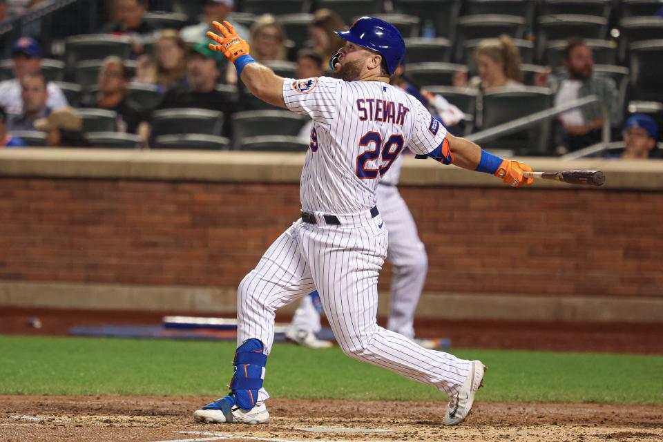 Aug 28, 2023; New York City, New York, USA; New York Mets right fielder DJ Stewart (29) hits a solo home run during the fifth inning against the Texas Rangers at Citi Field. Mandatory Credit: Vincent Carchietta-USA TODAY Sports