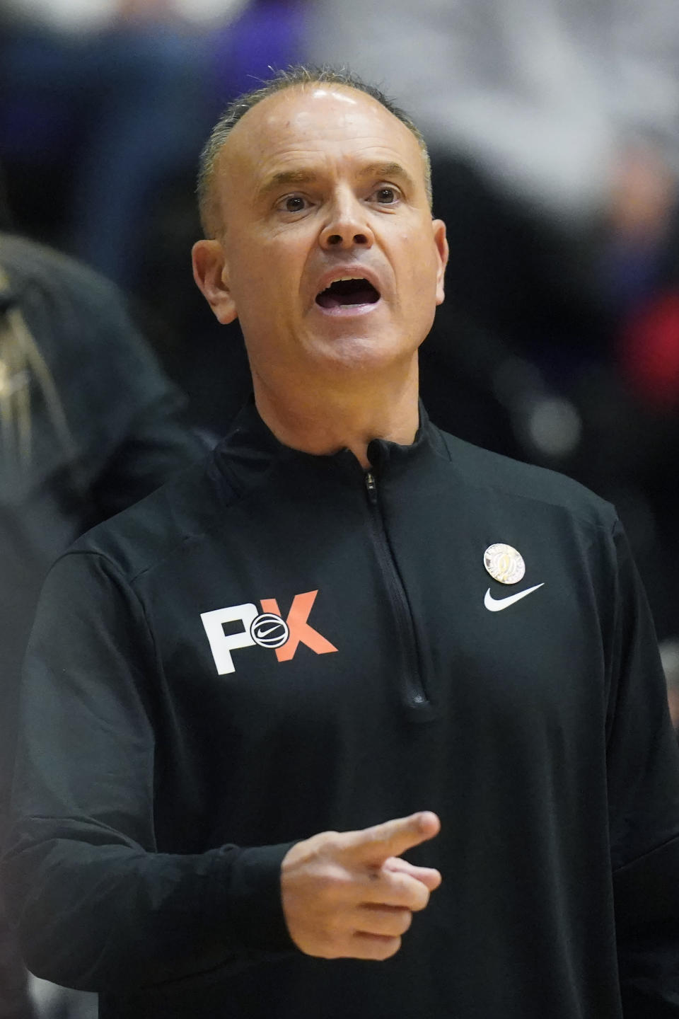 Oregon State head coach Scott Rueck shouts to his team during the first half of an NCAA college basketball game against Iowa in the Phil Knight Legacy tournament Friday, Nov. 25, 2022, in Portland, Ore. (AP Photo/Rick Bowmer)