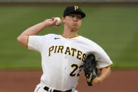 Pittsburgh Pirates starting pitcher Mitch Keller delivers during the first inning of the team's baseball game against the Chicago Cubs in Pittsburgh, Saturday, April 10, 2021. (AP Photo/Gene J. Puskar)