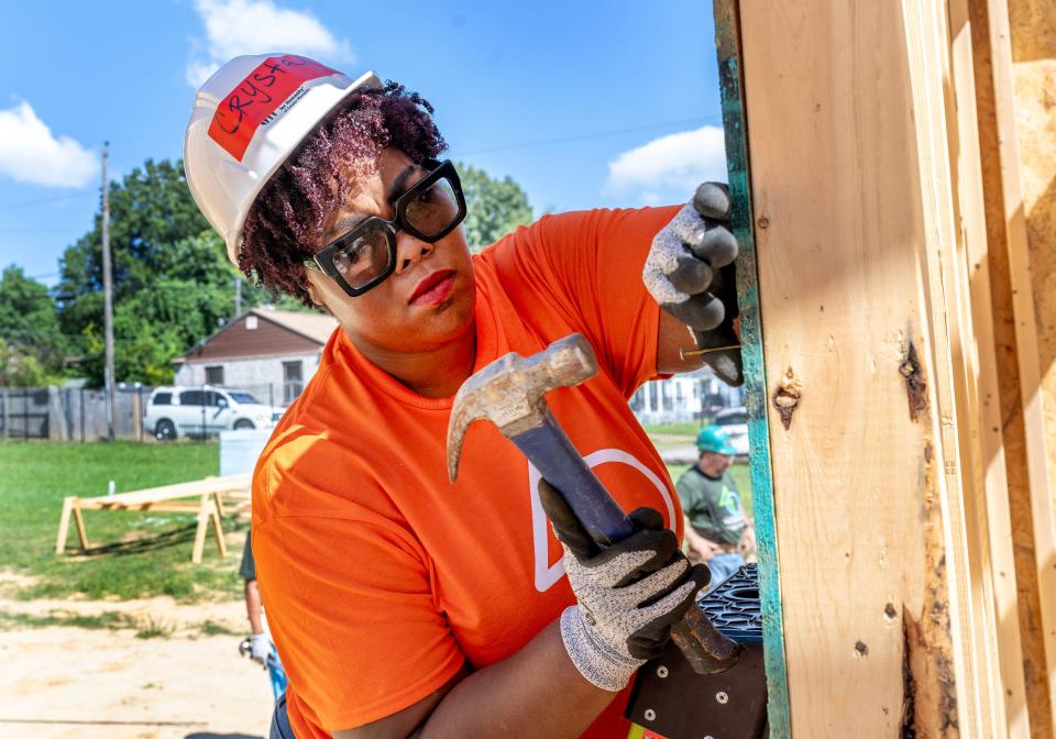 Crystal Jones, Habitat homebuyer, volunteered at Memphis Habitat’s 40th Anniversary Build kickoff in Castalia Heights on Thursday, Aug. 17. Jones bought her home with a no-interest Habitat mortgage in 2019.