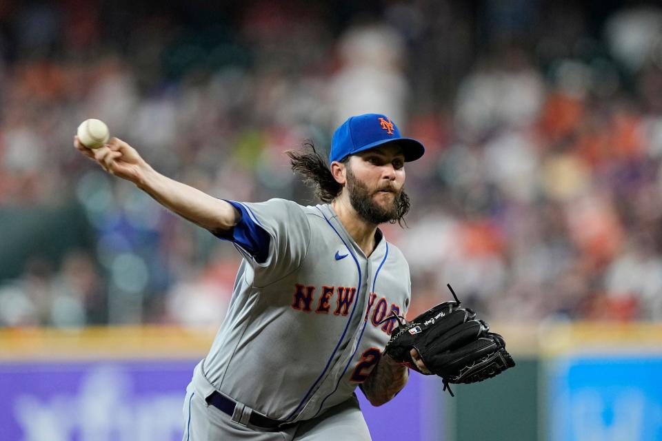 New York Mets starting pitcher Trevor Williams throws during the first inning of a baseball game against the Houston Astros Tuesday, June 21, 2022, in Houston.