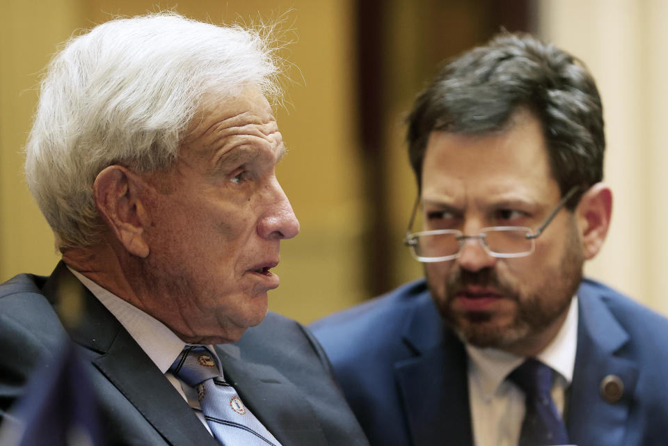 Senate Majority Leader Richard Saslaw, D-Fairfax, left, confers with state Sen. Scott Surovell, D-Fairfax, as the Senate is in session in the State Capitol in Richmond, Va., Thursday, Jan. 26, 2023. (Alexa Welch Edlund/Richmond Times-Dispatch via AP)