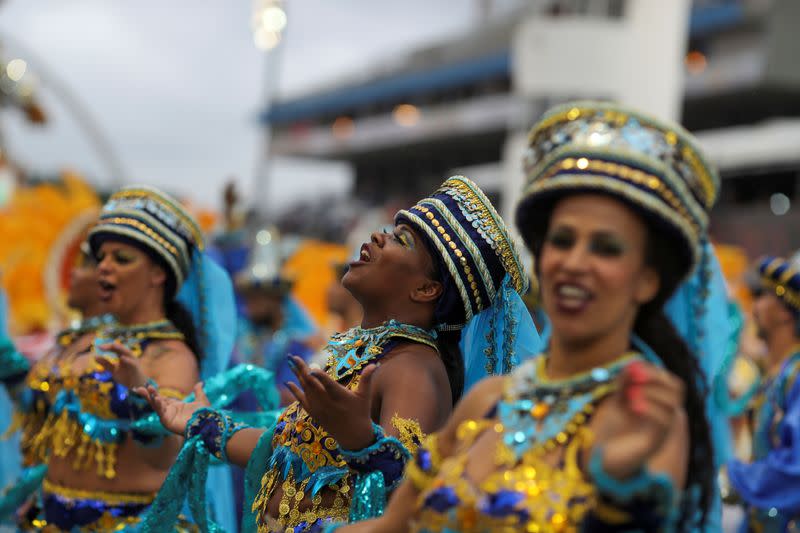 Revellers from Imperio de Casa Verde samba school perform during the first night of the Carnival parade at the Sambadrome in Sao Paulo