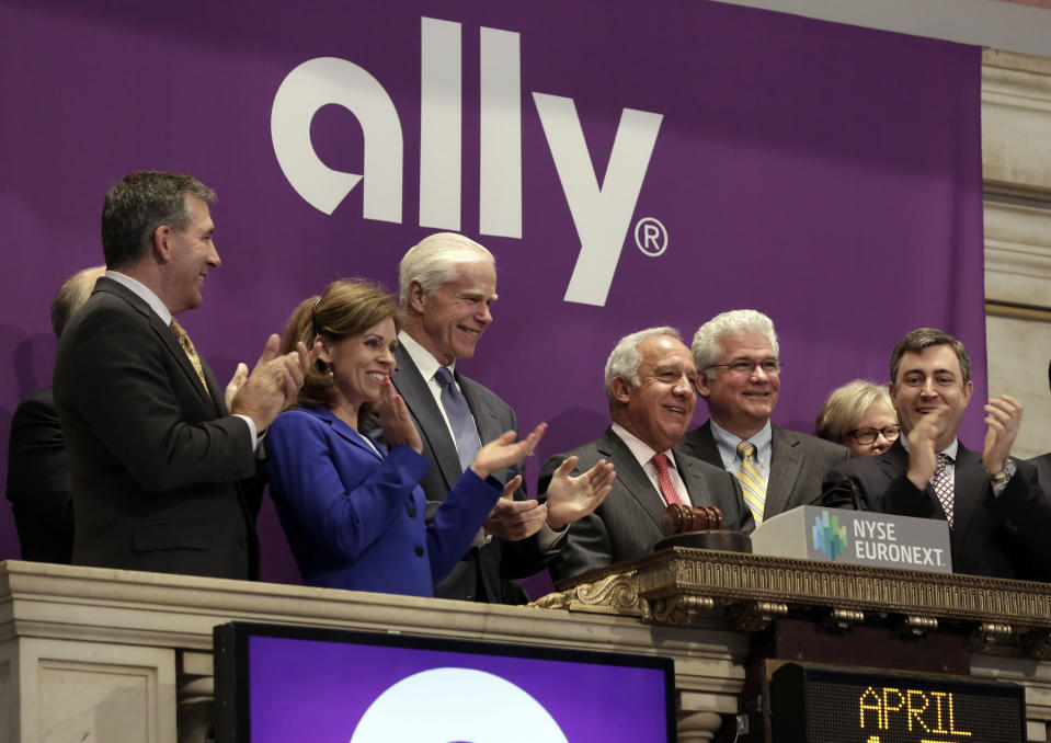 FILE - In this April 10, 2014 file photo, Ally Financial CEO Michael Carpenter, third from right, is applauded as he rings the New York Stock Exchange opening bell to mark his company's IPO. So far in 2014, IPOs are having their best start to a year since 2000, with 89 companies raising $19 billion through sales of new stock. But demand for more offerings depends largely on the health of the broader market, and after last week’s sell-off, the clamor from buyers may quiet down. (AP Photo/Richard Drew, File)