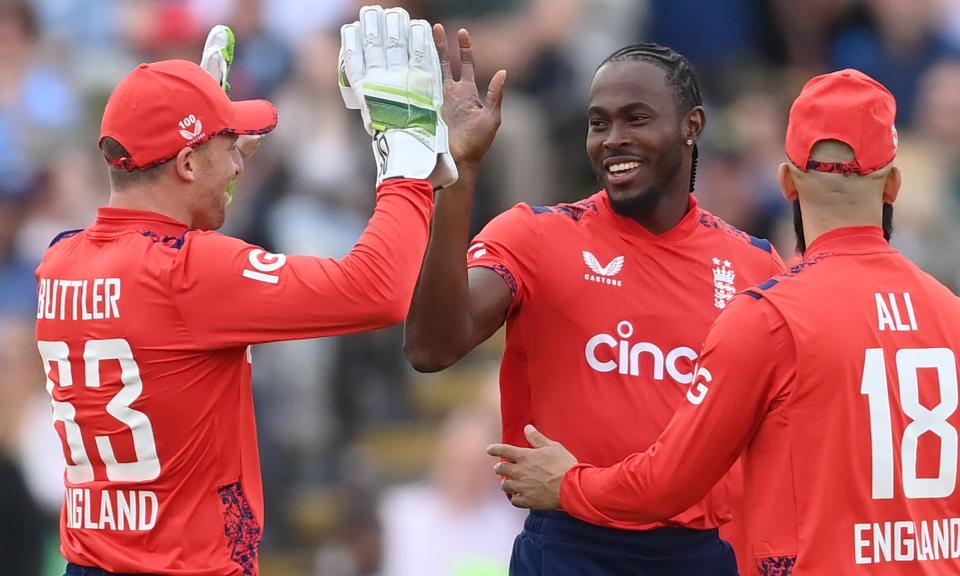 <span>Jofra Archer celebrates with teammates after dismissing Azam Khan.</span><span>Photograph: Philip Brown/Getty Images</span>