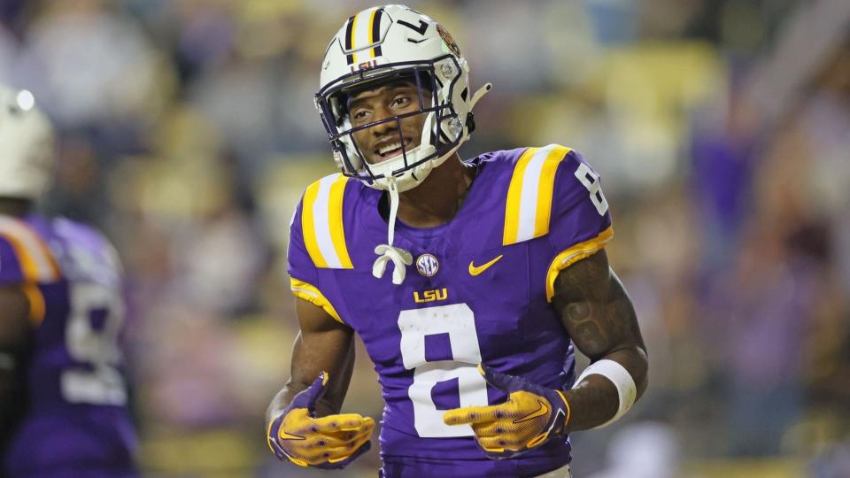 Nov 18, 2023; Baton Rouge, Louisiana, USA; LSU Tigers wide receiver Malik Nabers (8) celebrates his 40-yard touchdown catch in the fourth quarter against the Georgia State Panthers at Tiger Stadium.